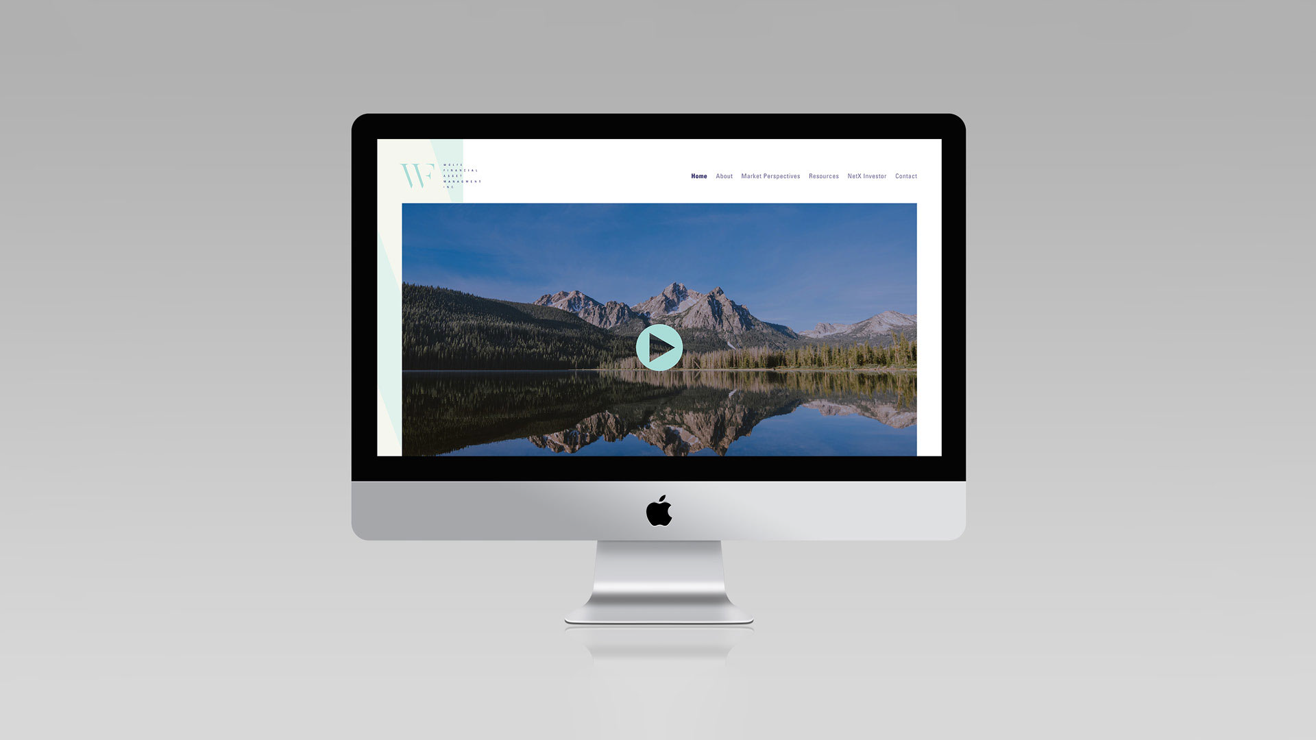An image of a Mac computer. on the screen is a UI interaface for a website.